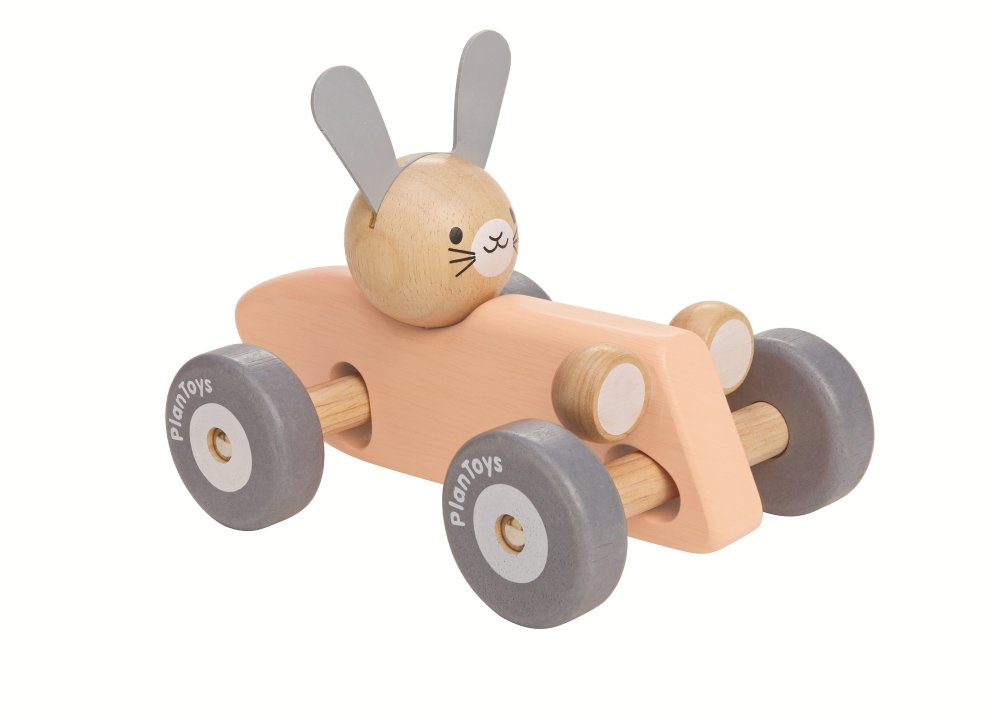 Plan Toys Hase im rosa Rennwagen Plan Toys