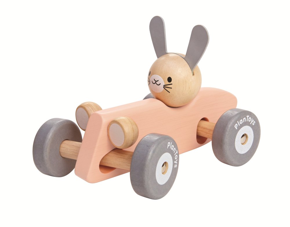 Plan Toys Hase im rosa Rennwagen Plan Toys